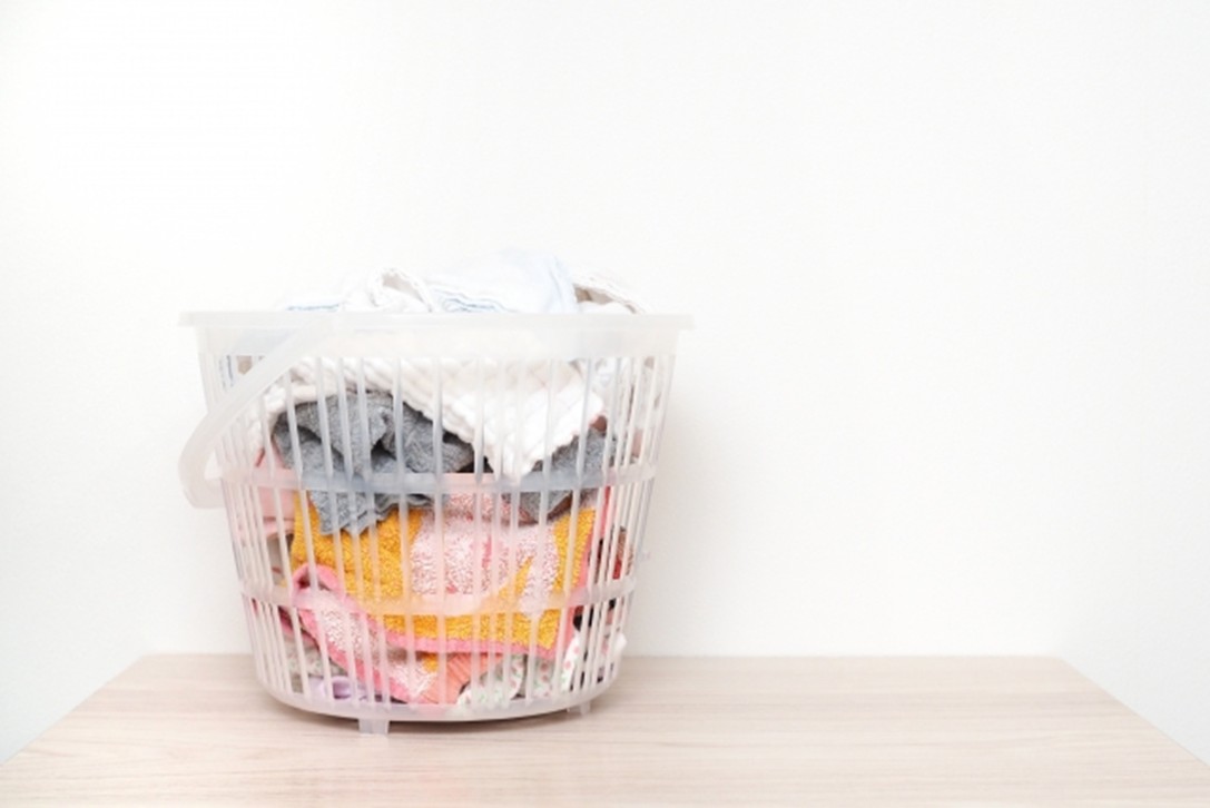 洗濯物がカゴに入っているイメージ
